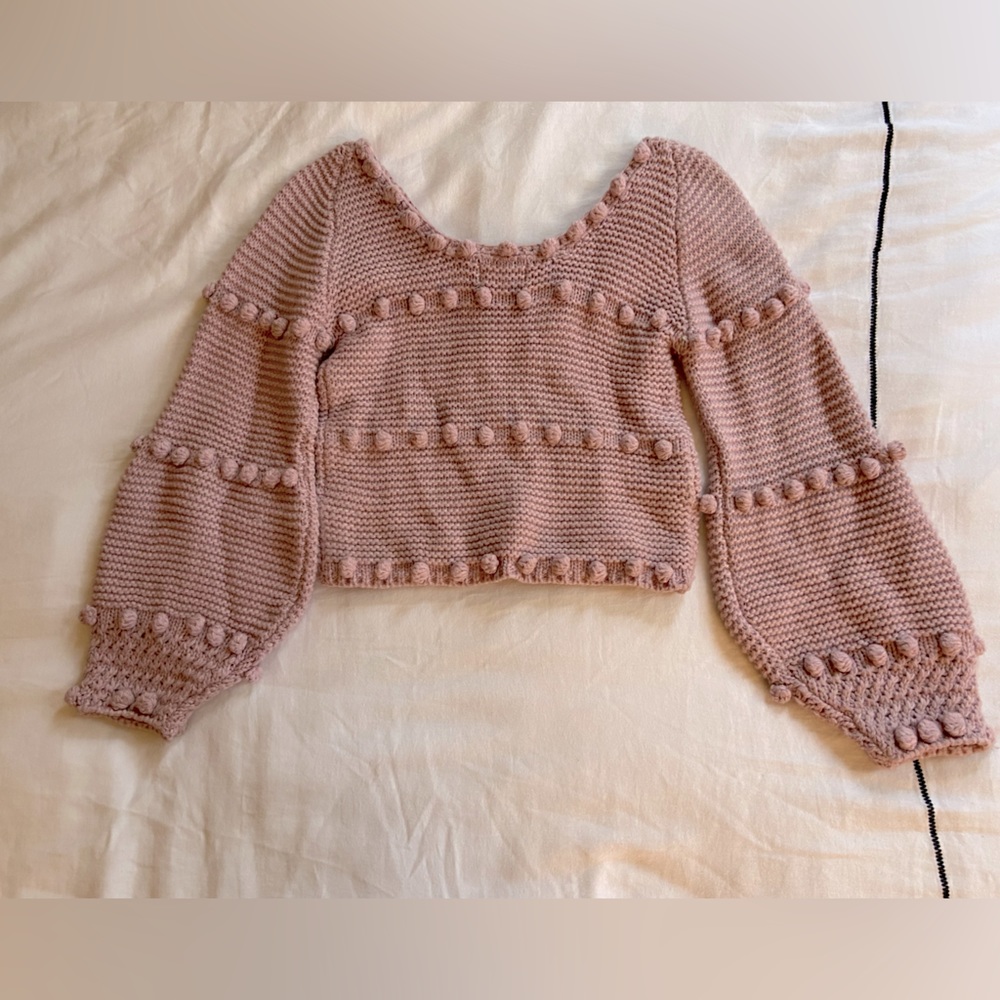 Sweater with ball design